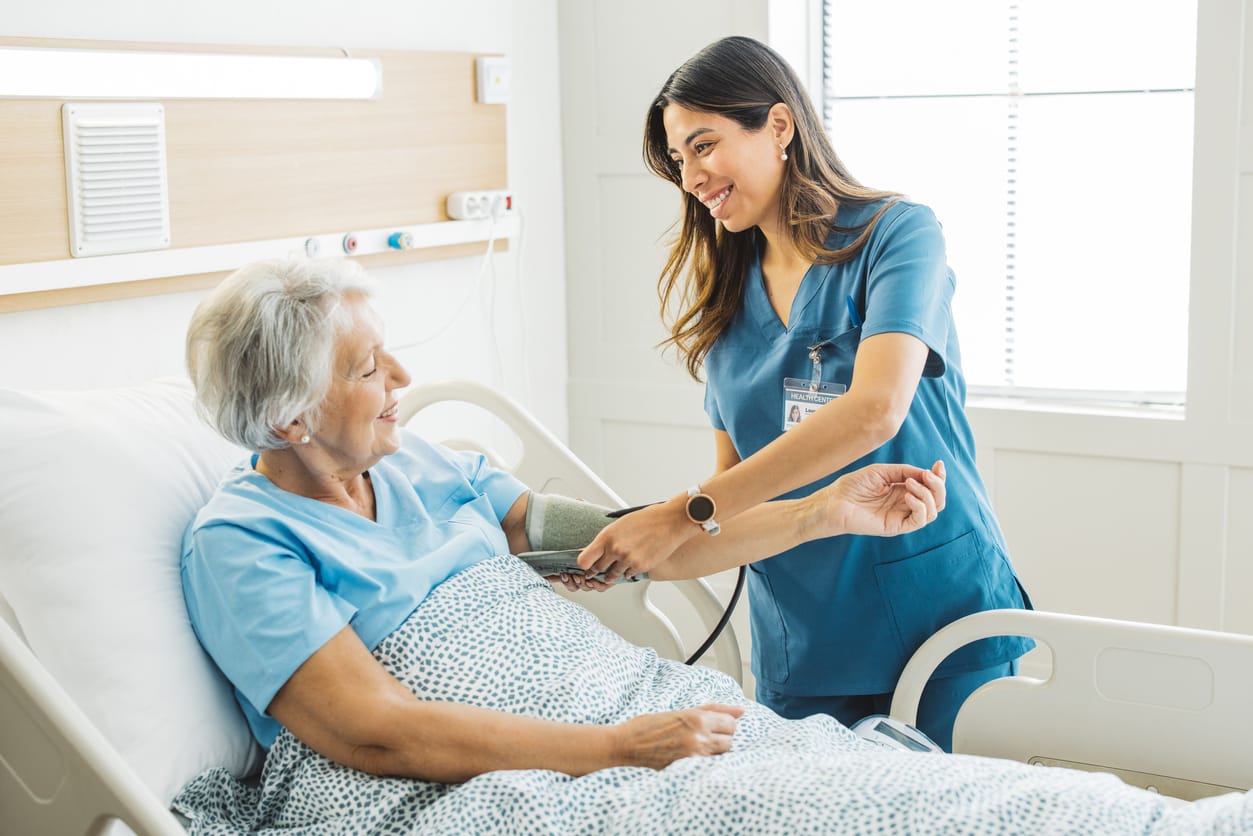 Students learning foundational healthcare skills through nursing preparation training at Apex Community College in Surrey, BC.