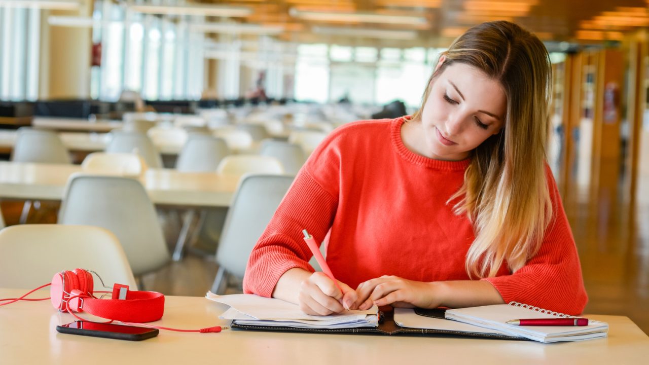 Students preparing for English proficiency exams through test preparation courses at Apex Community College in Surrey, BC.